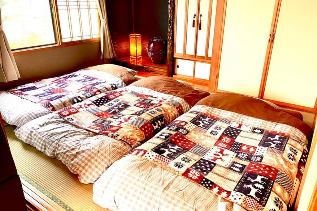 Manyi'S Onsen House 天然温泉マンイの湯 Villa Shiraoi Exterior foto