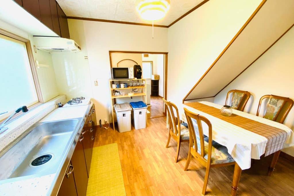 Manyi'S Onsen House 天然温泉マンイの湯 Villa Shiraoi Exterior foto